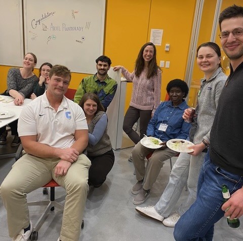 group of lab mates eating together