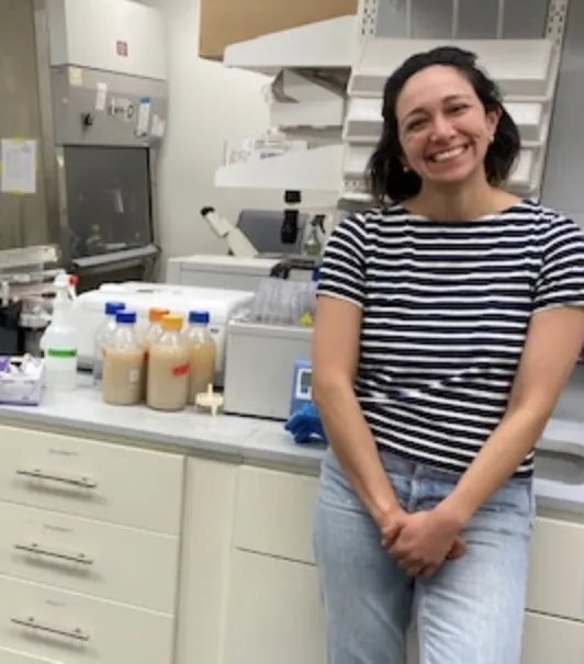 Dr Joan Pulupa is all smiles in the tissue culture room. 