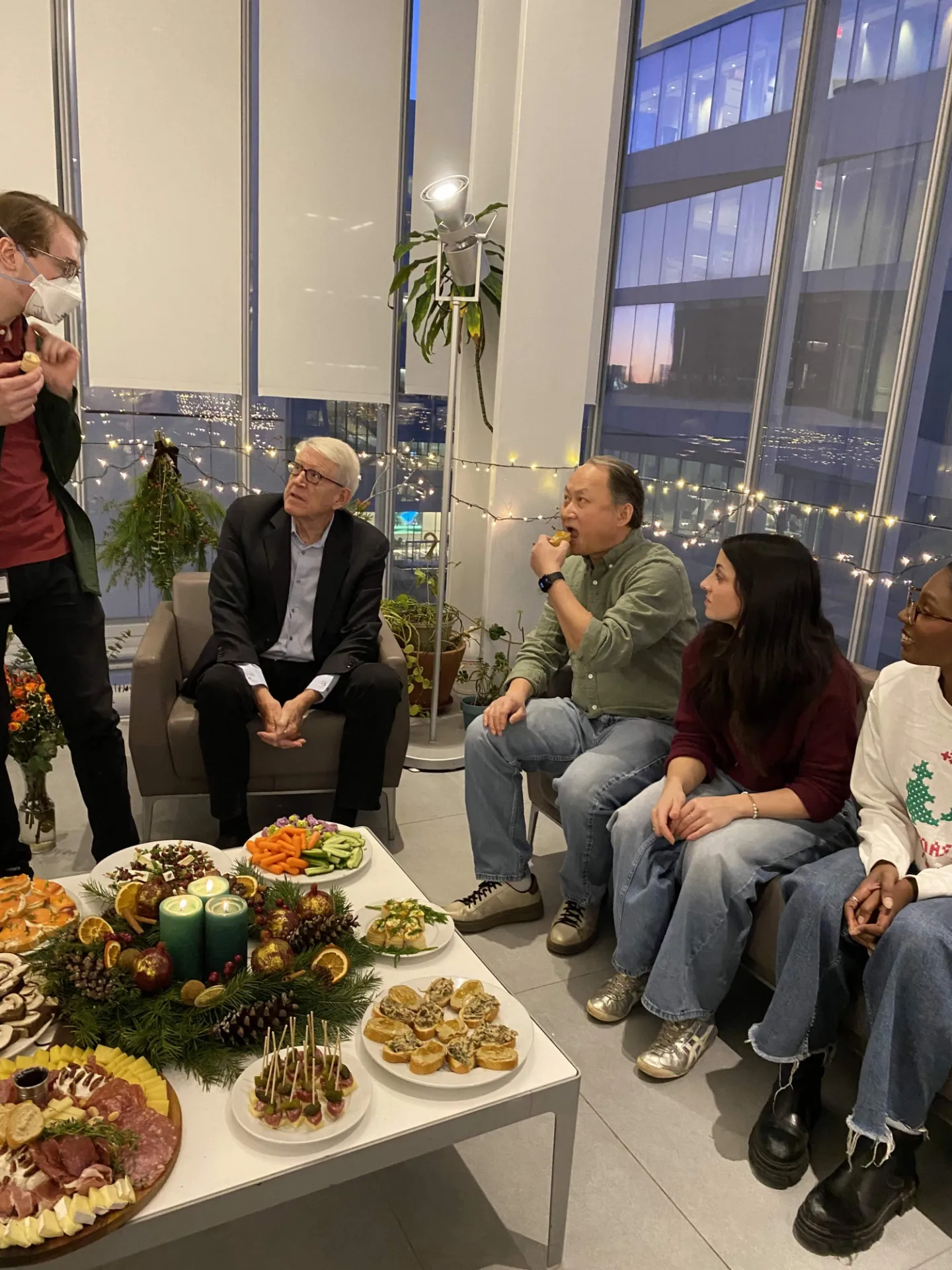 a group enjoying holiday bites 