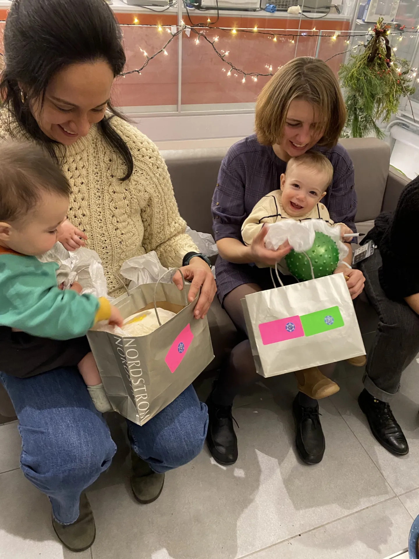 Babies opening presents 