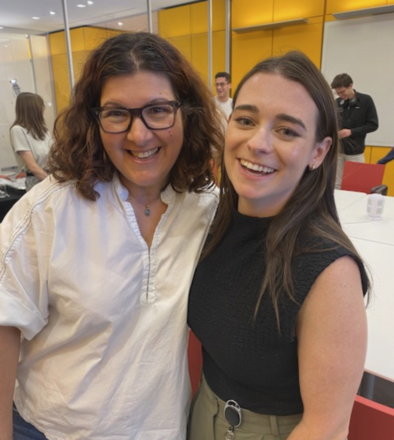 two people smiling together